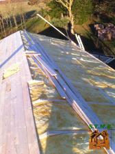 Isolation de la toiture  chalet en bois stmb construction 