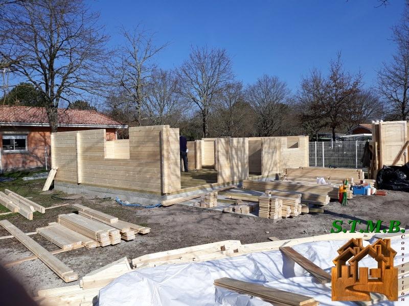 Construire en bois avec l’aide des maisons en kit. STMB